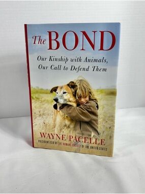 The Bond by Wayne Pacelle - Hardcover Book with Red Title